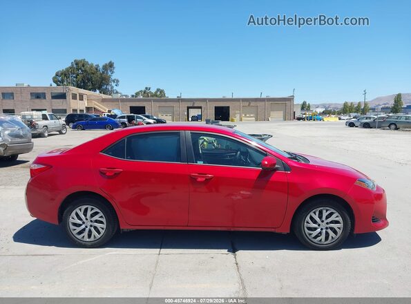 2T1BURHE2KC134910 2019 TOYOTA COROLLA Красный Вид задней части салона
