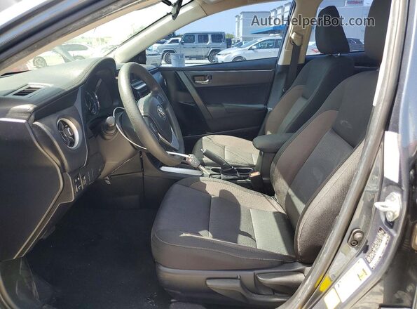 2T1BURHE2KC173545 2019 TOYOTA COROLLA Синий Вид салона спереди