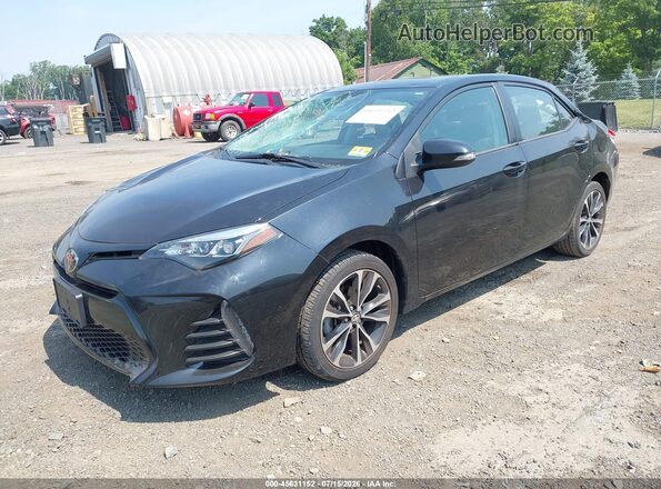 2T1BURHE2KC191060 2019 TOYOTA COROLLA Black Vista tres cuartos delantera izquierda