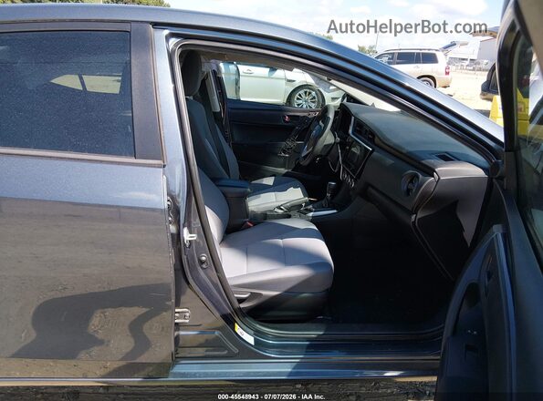 2T1BURHE2KC192905 2019 TOYOTA COROLLA Blue Вид салону спереду