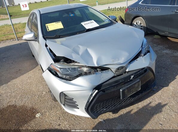 2T1BURHE2KC240127 2019 TOYOTA COROLLA Silver Դիմացի տեսք