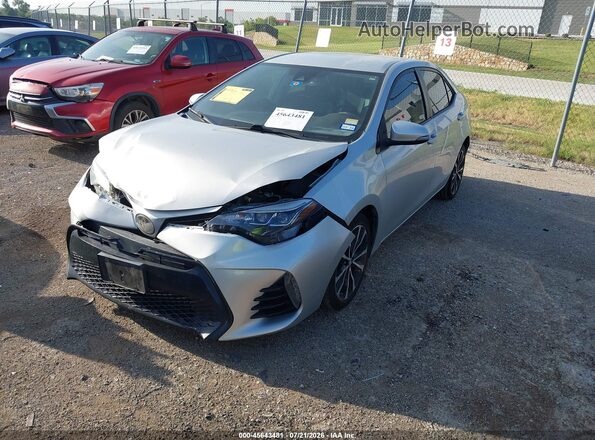 2T1BURHE2KC240127 2019 TOYOTA COROLLA Silver Առջևի ձախ երեք քառորդ տեսարան