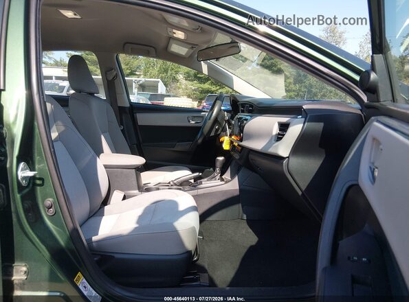 2T1BURHE3GC728378 2016 TOYOTA COROLLA Зеленый Вид салона спереди