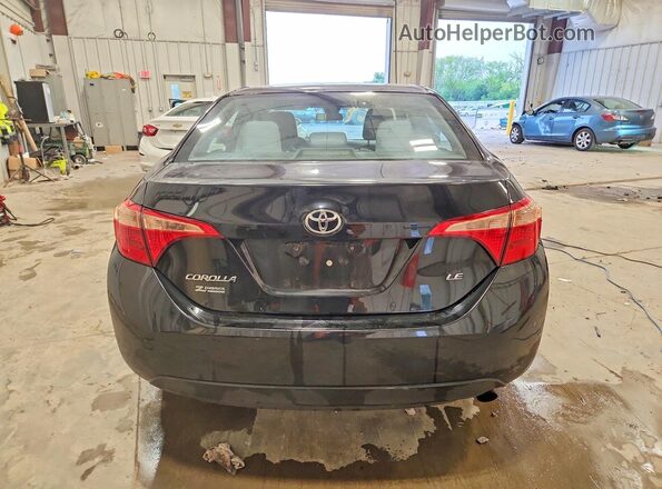 2T1BURHE3HC892862 2017 TOYOTA COROLLA Black Rear view
