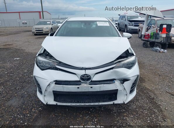 2T1BURHE3HC929814 2017 TOYOTA COROLLA Белый Вид задней части салона