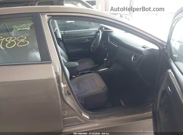 2T1BURHE3HC938030 2017 TOYOTA COROLLA Brown Vista interior delantera