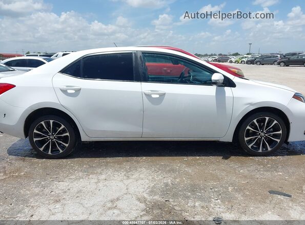 2T1BURHE3JC019960 2018 TOYOTA COROLLA White Widok wnętrza z tyłu