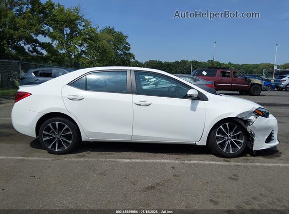 2T1BURHE3KC135516 2019 TOYOTA COROLLA Белый Вид задней части салона