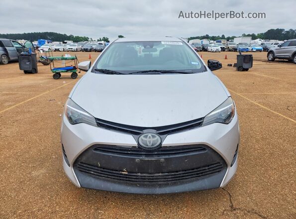 2T1BURHE3KC140943 2019 TOYOTA COROLLA Silver Front view