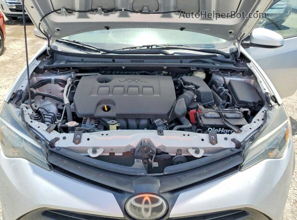 2T1BURHE3KC173831 2019 TOYOTA COROLLA Silver Rear interior view