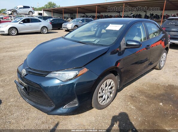 2T1BURHE3KC213129 2019 TOYOTA COROLLA Blue Vista tres cuartos delantera izquierda