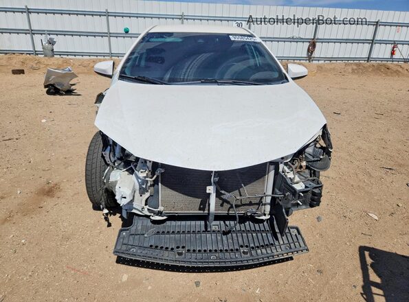 2T1BURHE3KC235664 2019 TOYOTA COROLLA Белый Вид спереди