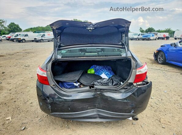 2T1BURHE4GC668966 2016 TOYOTA COROLLA Черный Вид сзади
