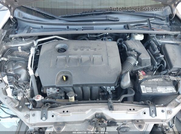 2T1BURHE4HC859384 2017 TOYOTA COROLLA Beige Vista trasera
