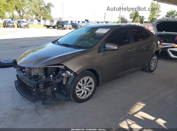 2T1BURHE4HC859384 2017 TOYOTA COROLLA Beige Vista tres cuartos delantera izquierda
