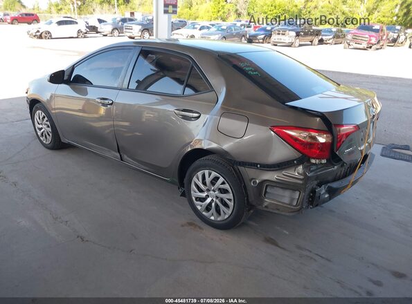 2T1BURHE4HC859384 2017 TOYOTA COROLLA Beige Trasero izquierdo