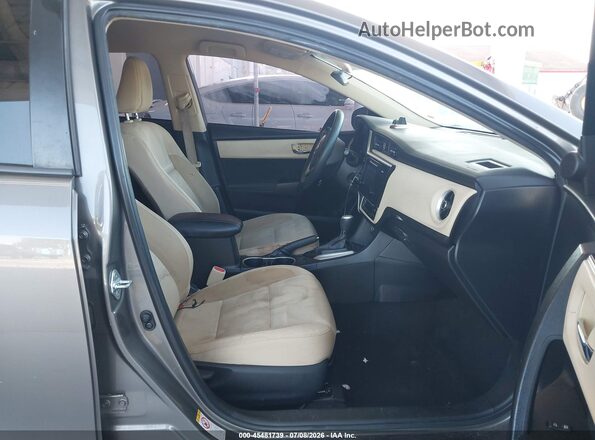 2T1BURHE4HC859384 2017 TOYOTA COROLLA Beige Vista interior delantera