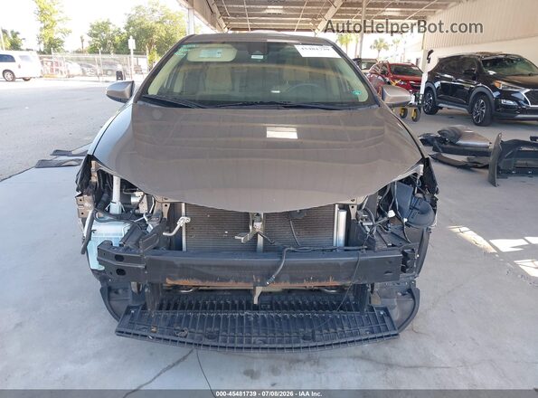 2T1BURHE4HC859384 2017 TOYOTA COROLLA Beige Vista interior trasera