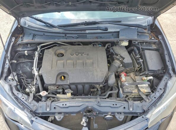 2T1BURHE4HC895866 2017 TOYOTA COROLLA Black Vista interior trasera