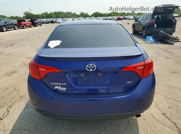 2T1BURHE4HC929952 2017 TOYOTA COROLLA Blue Widok z tyłu