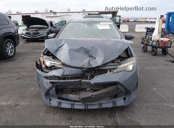 2T1BURHE4HC932284 2017 TOYOTA COROLLA Gray Вид задньої частини салону