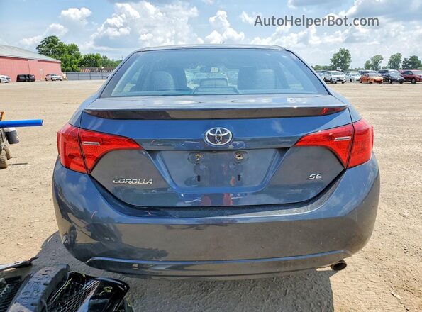 2T1BURHE4HC935282 2017 TOYOTA COROLLA Синий Вид сзади