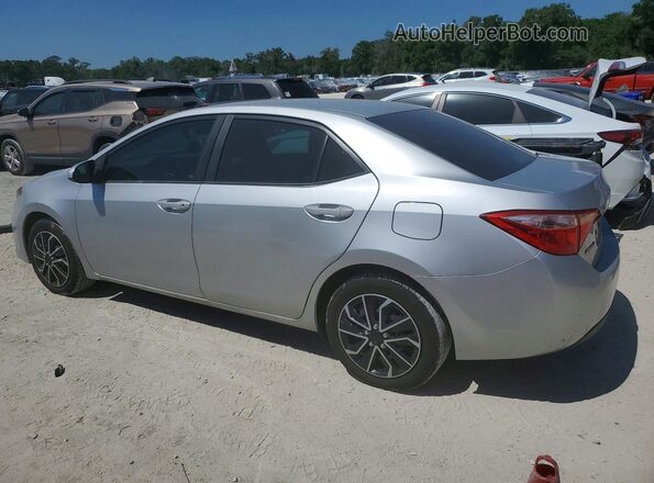 2T1BURHE4JC000737 2018 TOYOTA COROLLA Silver Tył lewy