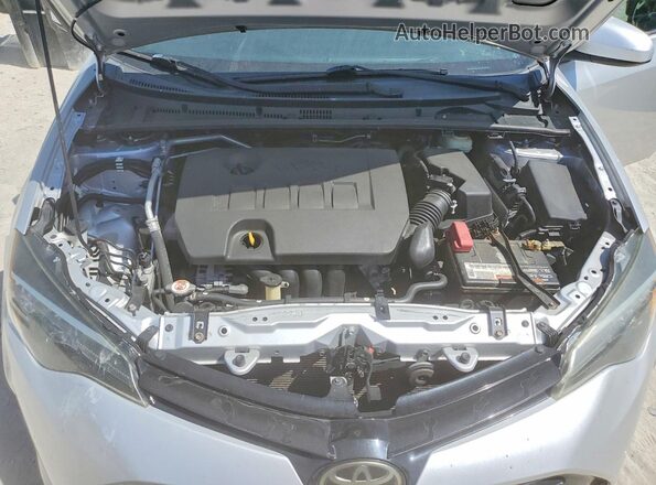 2T1BURHE4JC000737 2018 TOYOTA COROLLA Silver Widok wnętrza z tyłu