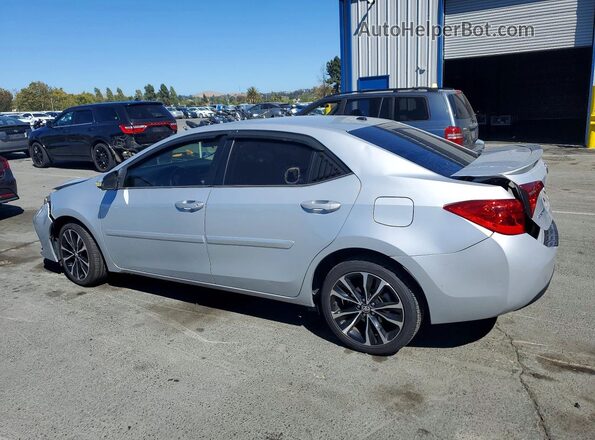 2T1BURHE4JC008028 2018 TOYOTA COROLLA Silver Հետևի ձախ