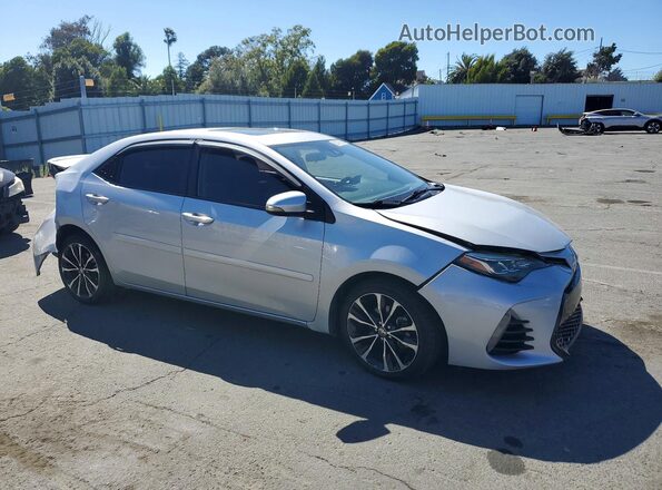 2T1BURHE4JC008028 2018 TOYOTA COROLLA Silver Առջևի աջ