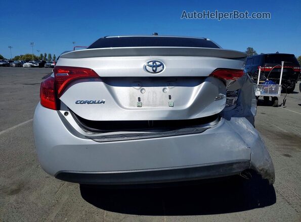 2T1BURHE4JC008028 2018 TOYOTA COROLLA Silver Հետևի տեսք