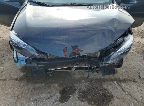 2T1BURHE4JC047167 2018 TOYOTA COROLLA Черный Вид задней части салона