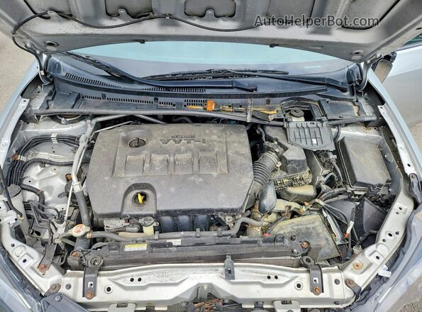 2T1BURHE4JC071047 2018 TOYOTA COROLLA Серебряный Вид задней части салона