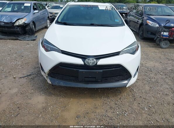 2T1BURHE4JC972273 2018 TOYOTA COROLLA White Front view