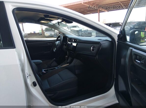 2T1BURHE4JC976162 2018 TOYOTA COROLLA White Front interior view