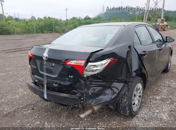 2T1BURHE4KC189990 2019 TOYOTA COROLLA Black Widok z przodu