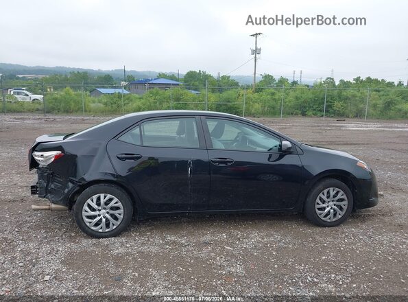2T1BURHE4KC189990 2019 TOYOTA COROLLA Black Widok wnętrza z tyłu