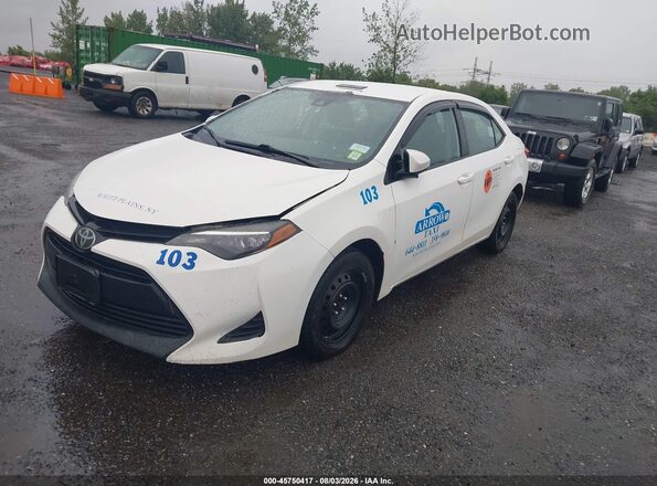 2T1BURHE4KC227766 2019 TOYOTA COROLLA White Front left