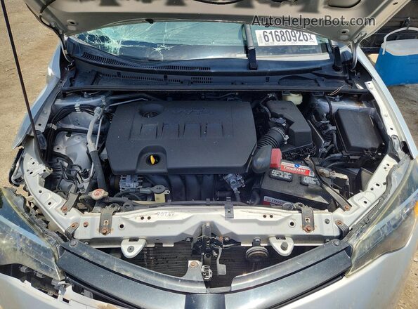 2T1BURHE5HC818102 2017 TOYOTA COROLLA Silver Vista interior trasera