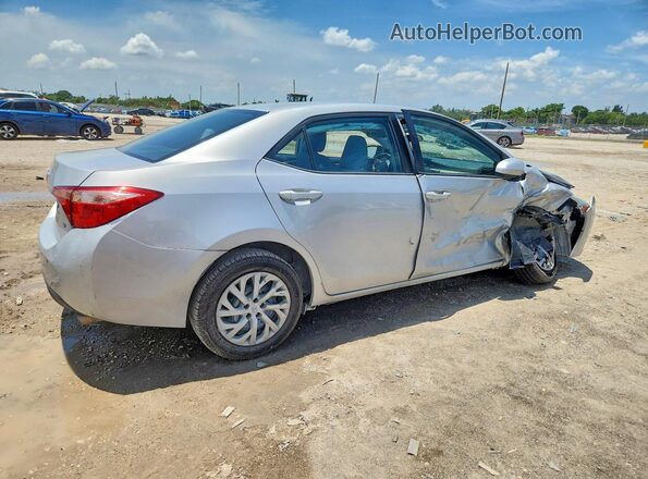2T1BURHE5HC818102 2017 TOYOTA COROLLA Silver Trasero derecho