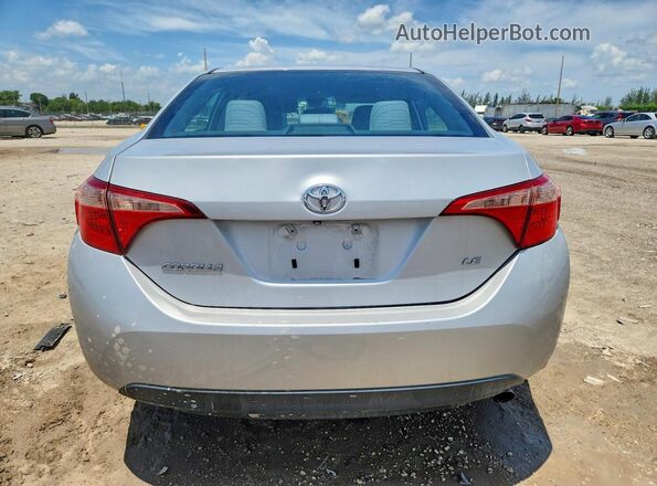 2T1BURHE5HC818102 2017 TOYOTA COROLLA Silver Vista trasera