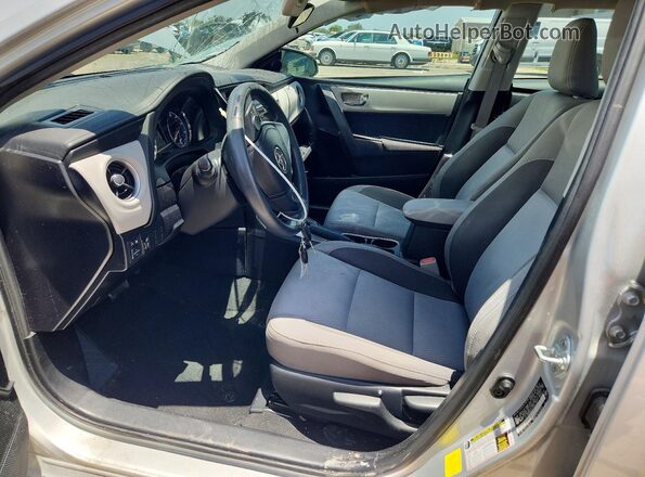 2T1BURHE5HC818102 2017 TOYOTA COROLLA Silver Vista interior delantera