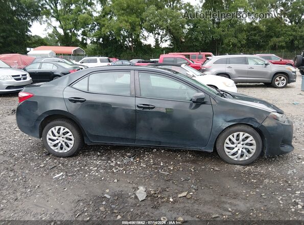 2T1BURHE5JC025517 2018 TOYOTA COROLLA Black Widok wnętrza z tyłu