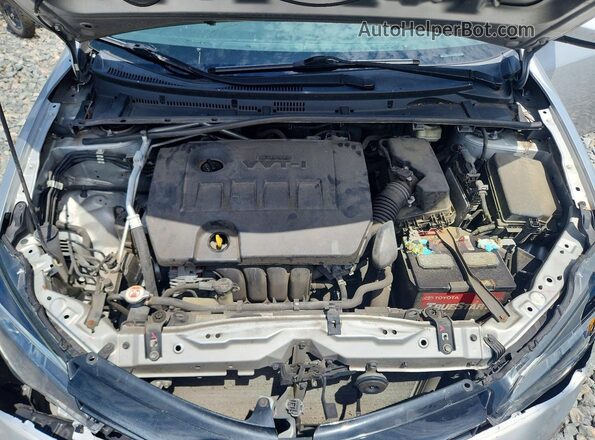 2T1BURHE5JC056377 2018 TOYOTA COROLLA Серебряный Вид задней части салона