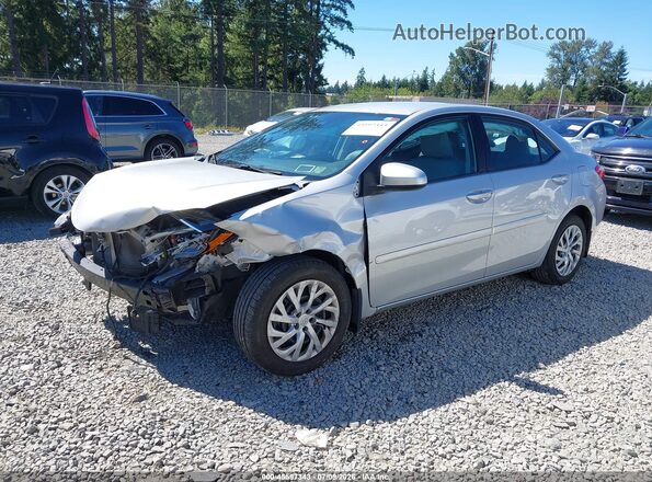 2T1BURHE5JC109143 2018 TOYOTA COROLLA Silver Vista tres cuartos delantera izquierda