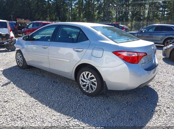 2T1BURHE5JC109143 2018 TOYOTA COROLLA Silver Trasero izquierdo