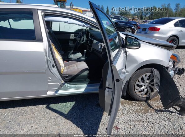 2T1BURHE5JC109143 2018 TOYOTA COROLLA Silver Vista interior delantera