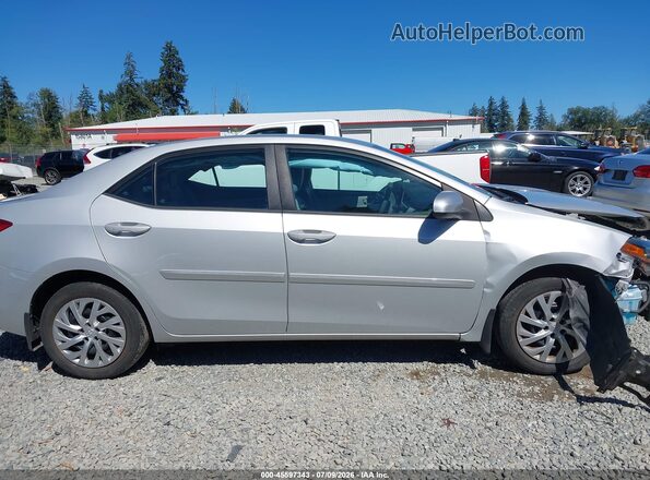 2T1BURHE5JC109143 2018 TOYOTA COROLLA Silver Vista interior trasera