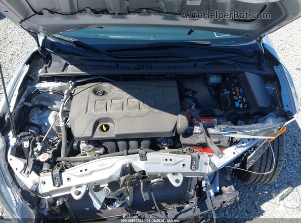 2T1BURHE5JC109143 2018 TOYOTA COROLLA Silver Vista trasera