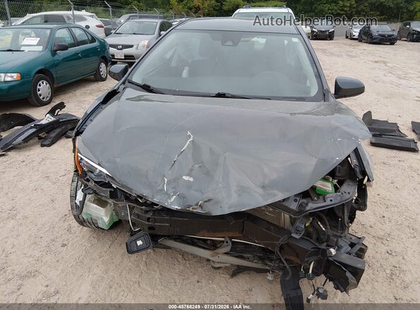 2T1BURHE5JC993827 2018 TOYOTA COROLLA Gray Rear interior view